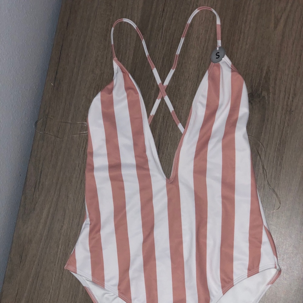pink and white striped plunge front one piece